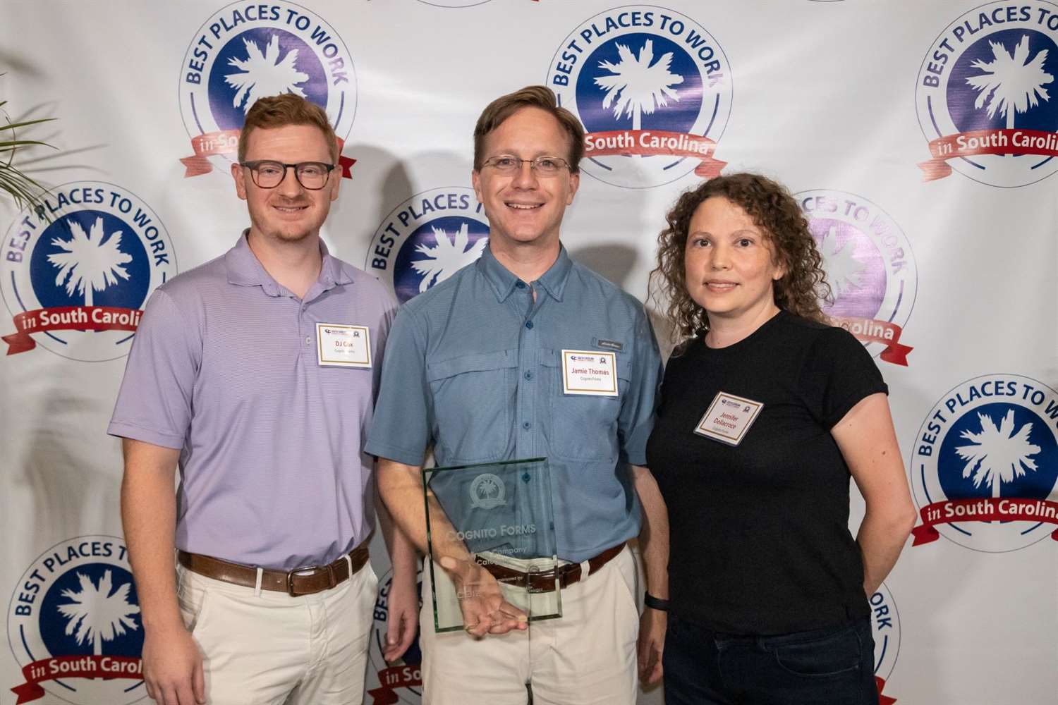 DJ Cox, Jamie Thomas, and Jennifer Dellacroce receiving the Best of Columbia Award