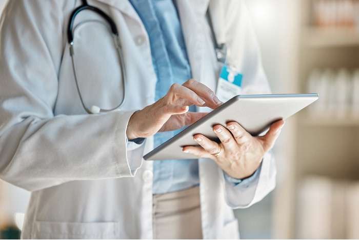 doctor reviewing medical records