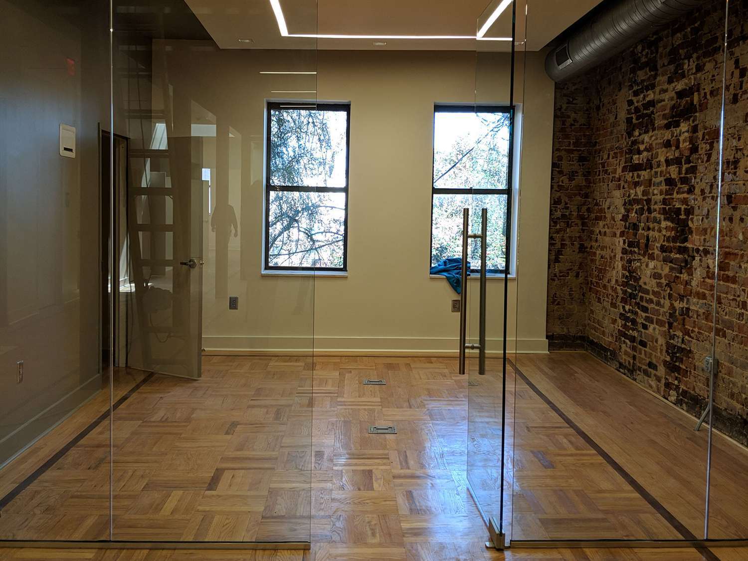 The other side of the room is one of several newly-designated conference area