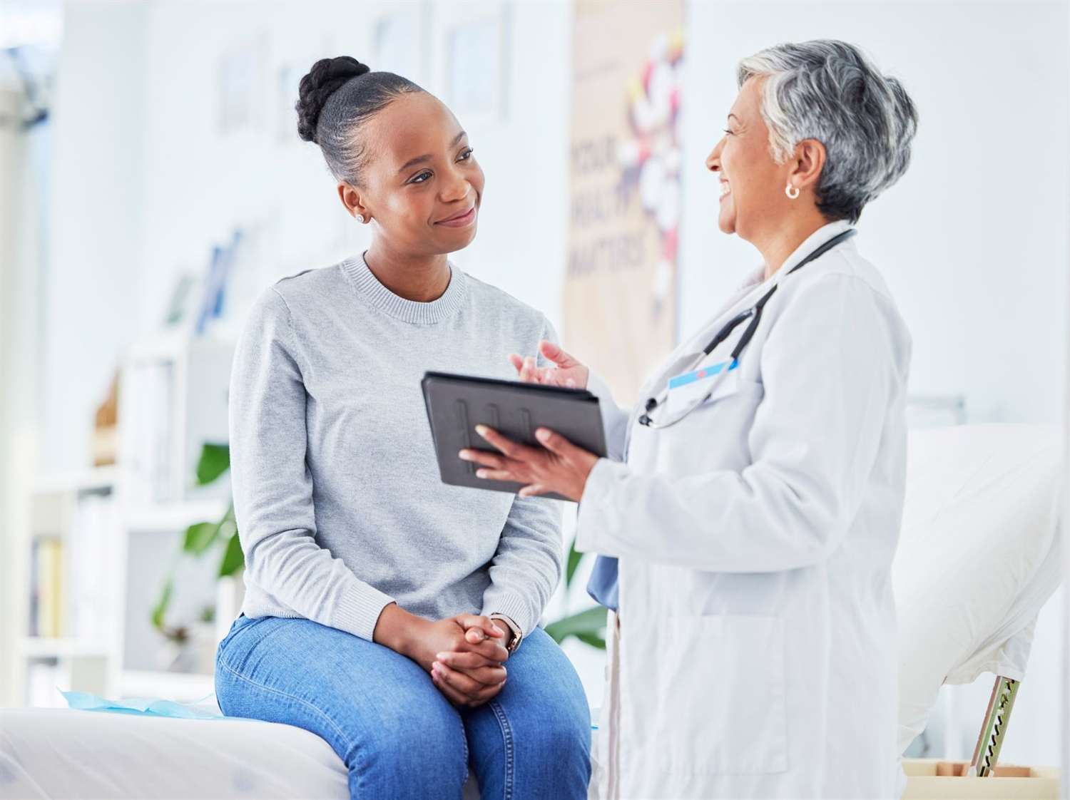 photo of doctor and patient in clinic