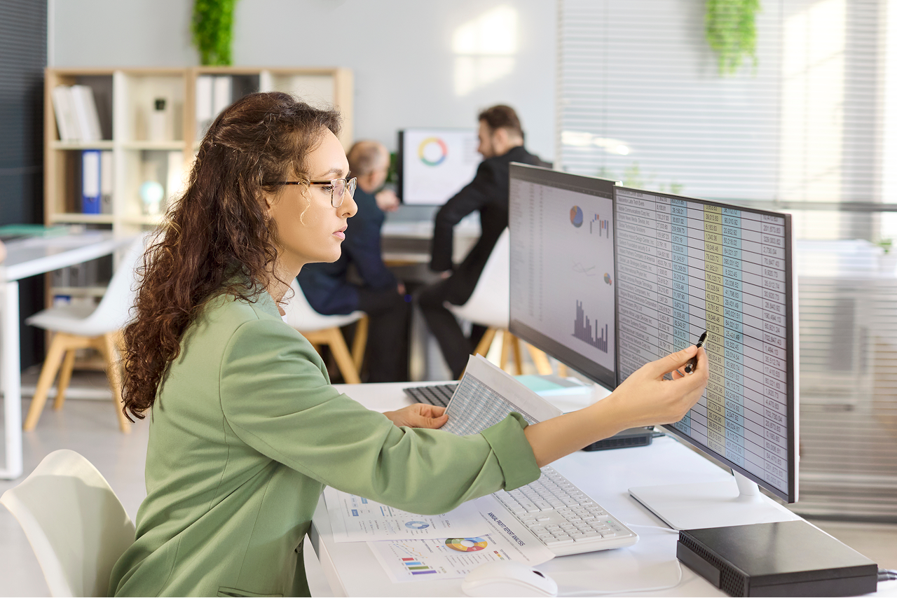photo of woman working on data entry on computer.png