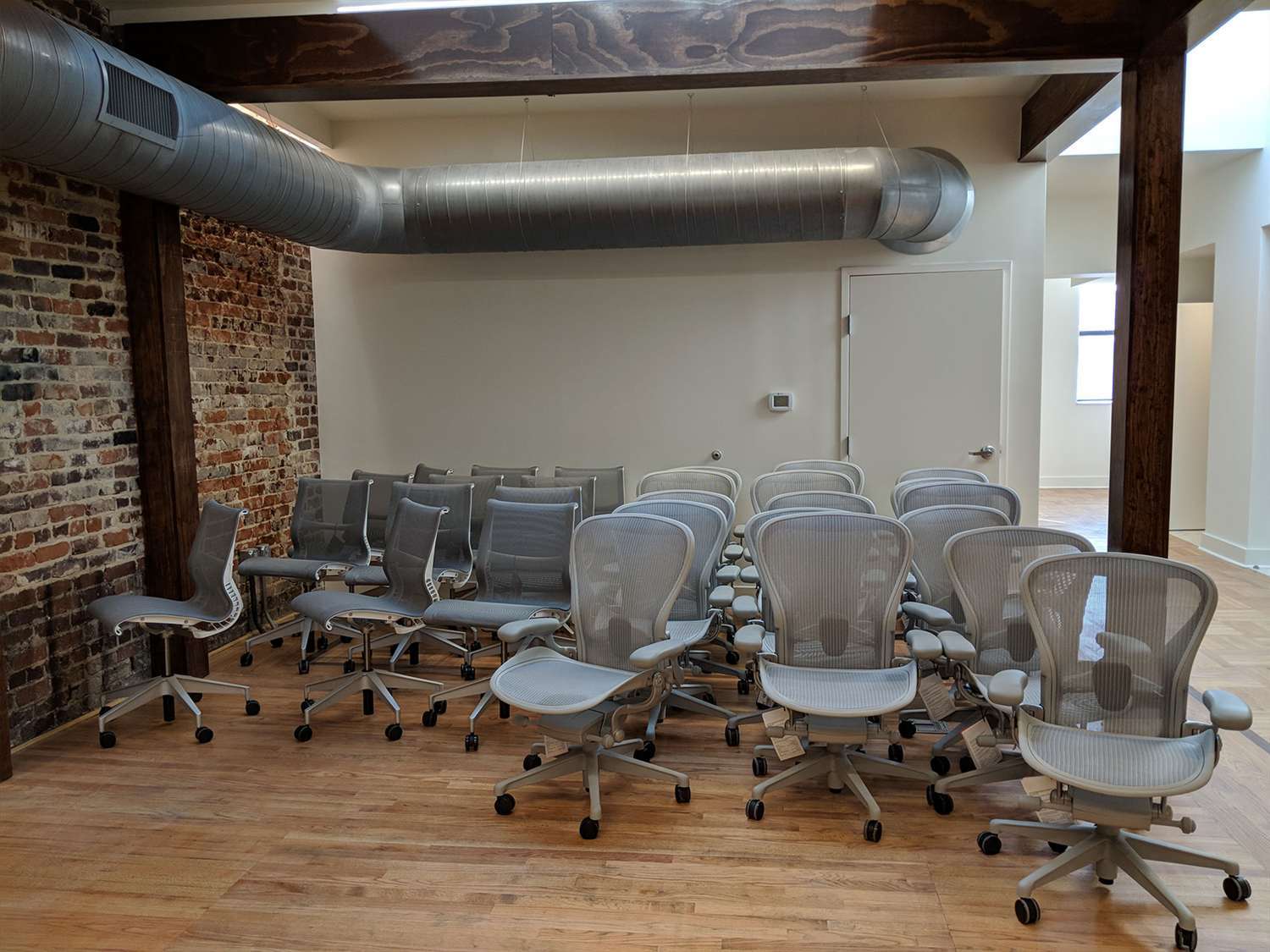 Picture with a lot of desk chairs