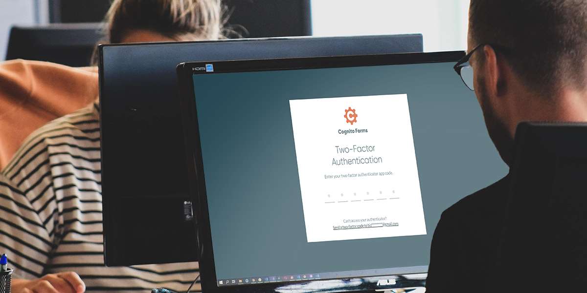 Man using two-factor authentication for Cognito Forms on computer.