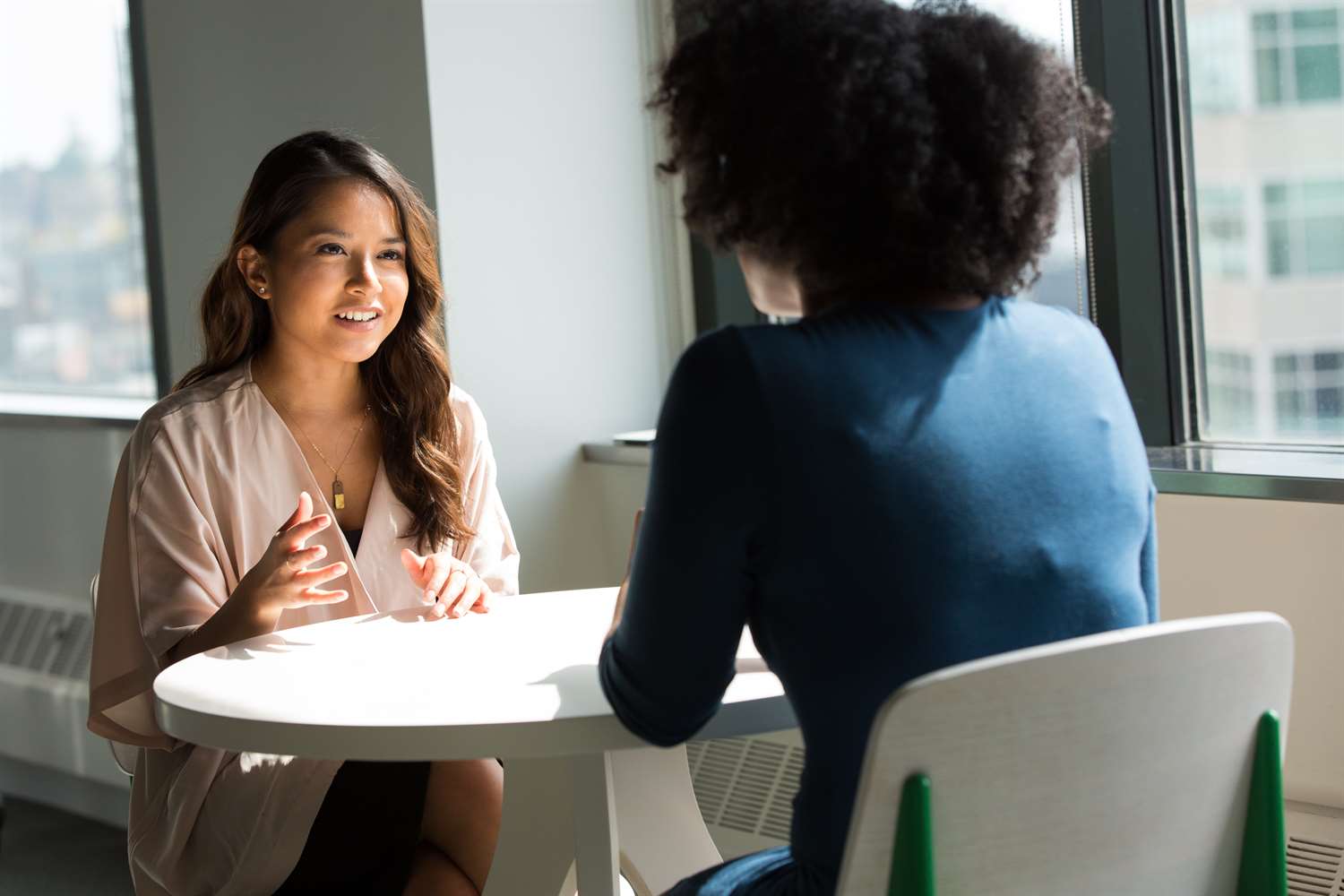 Woman conducting a job interview with another woman.